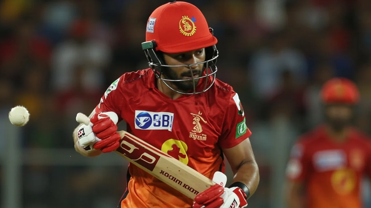 Cricket action under floodlights with a batter and fielders during an IPL match, illustrating the Royals' late-innings collapse
